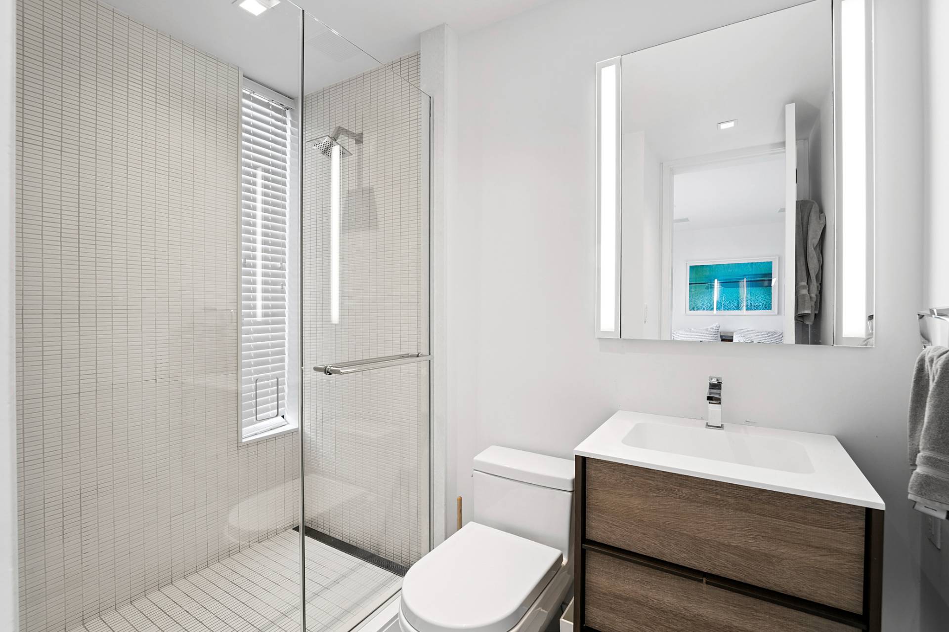 15 Deforest Road Montauk, NY 11954 - Photo 14 of 22 a bathroom with a toilet a sink and shower