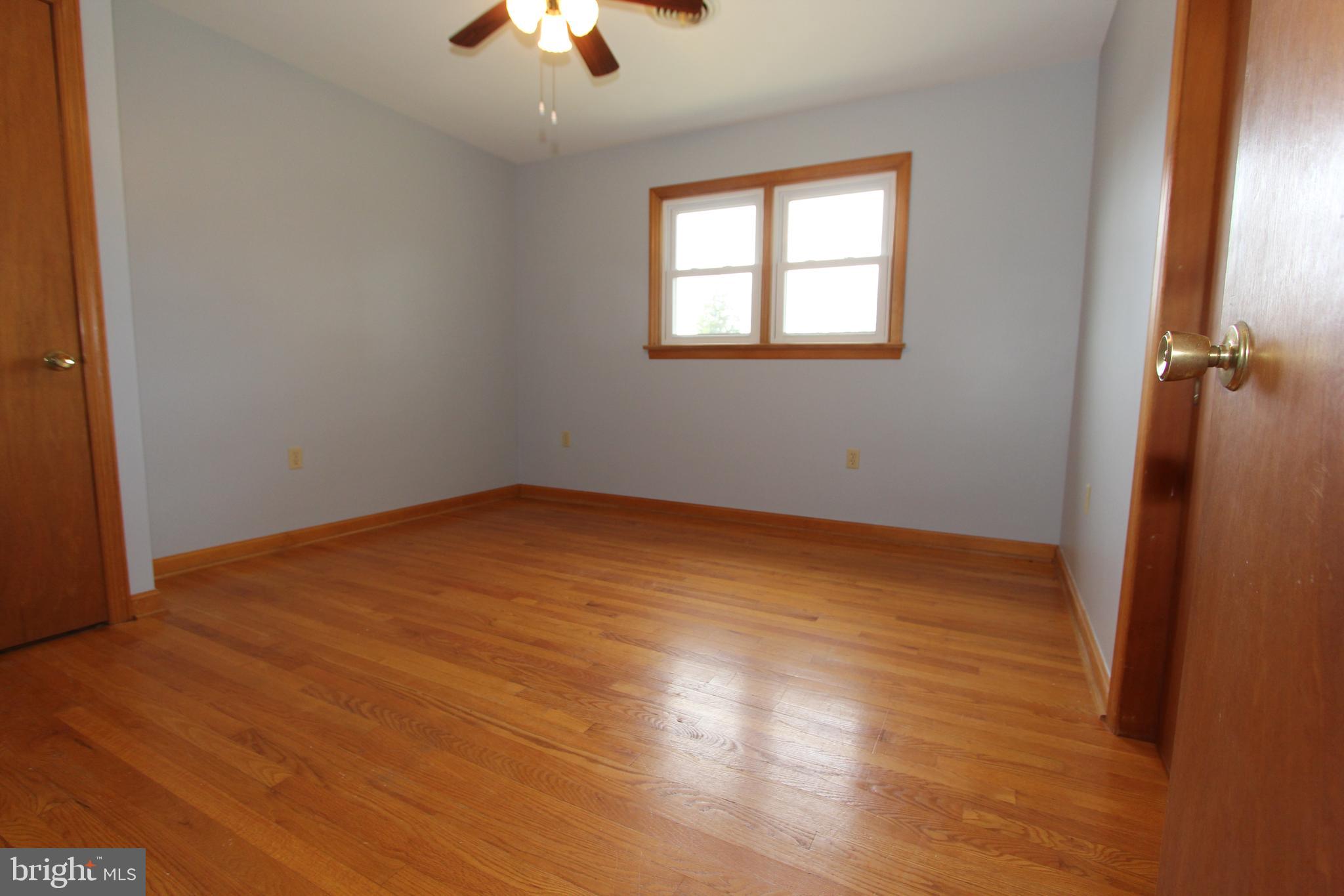 8001 Clearfield Road Frederick, MD 21702 - Photo 24 of 55 Bedroom 2 with hardwood floors