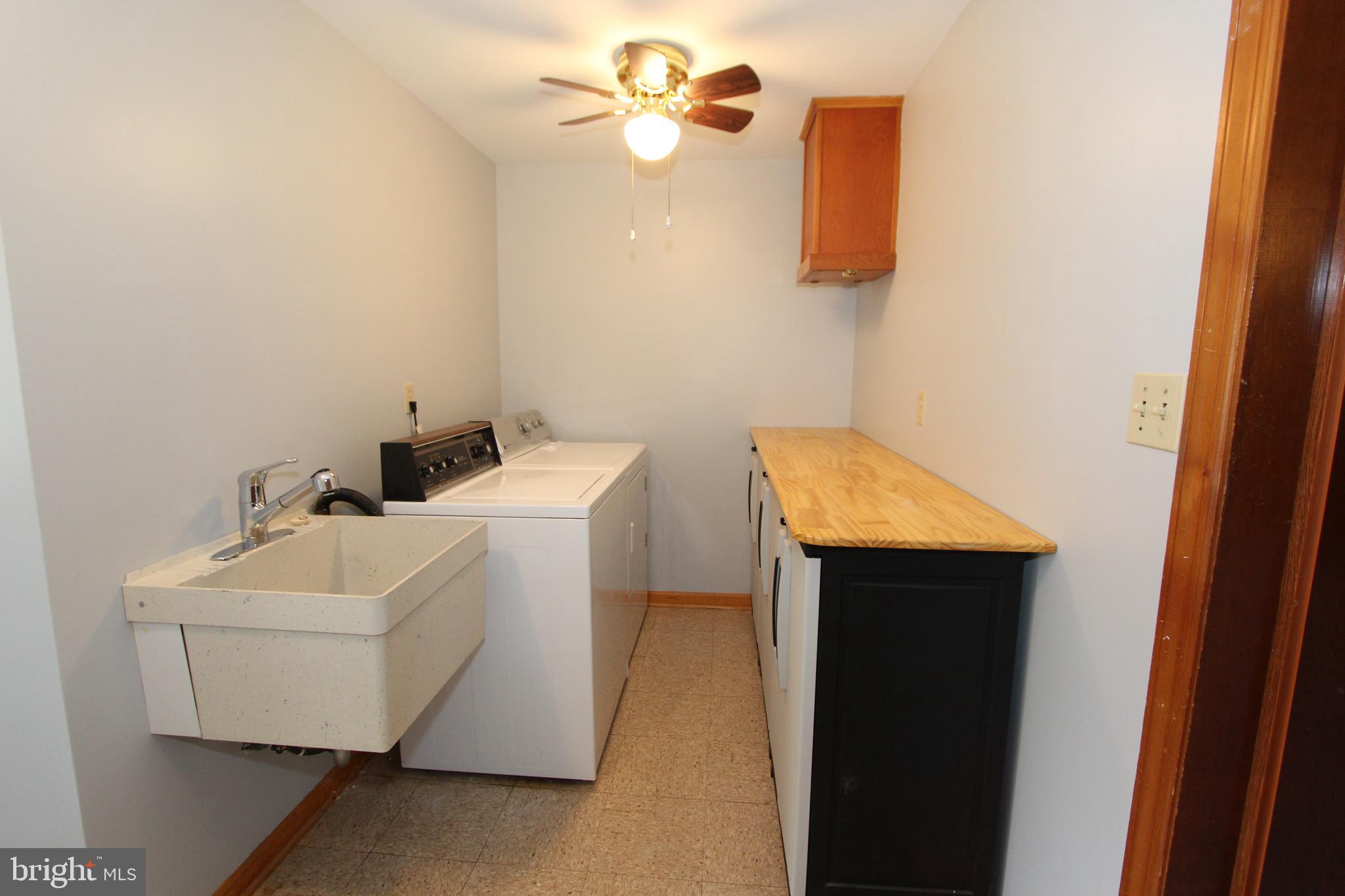 8001 Clearfield Road Frederick, MD 21702 - Photo 33 of 55 Big laundry room with laundry chute from above!