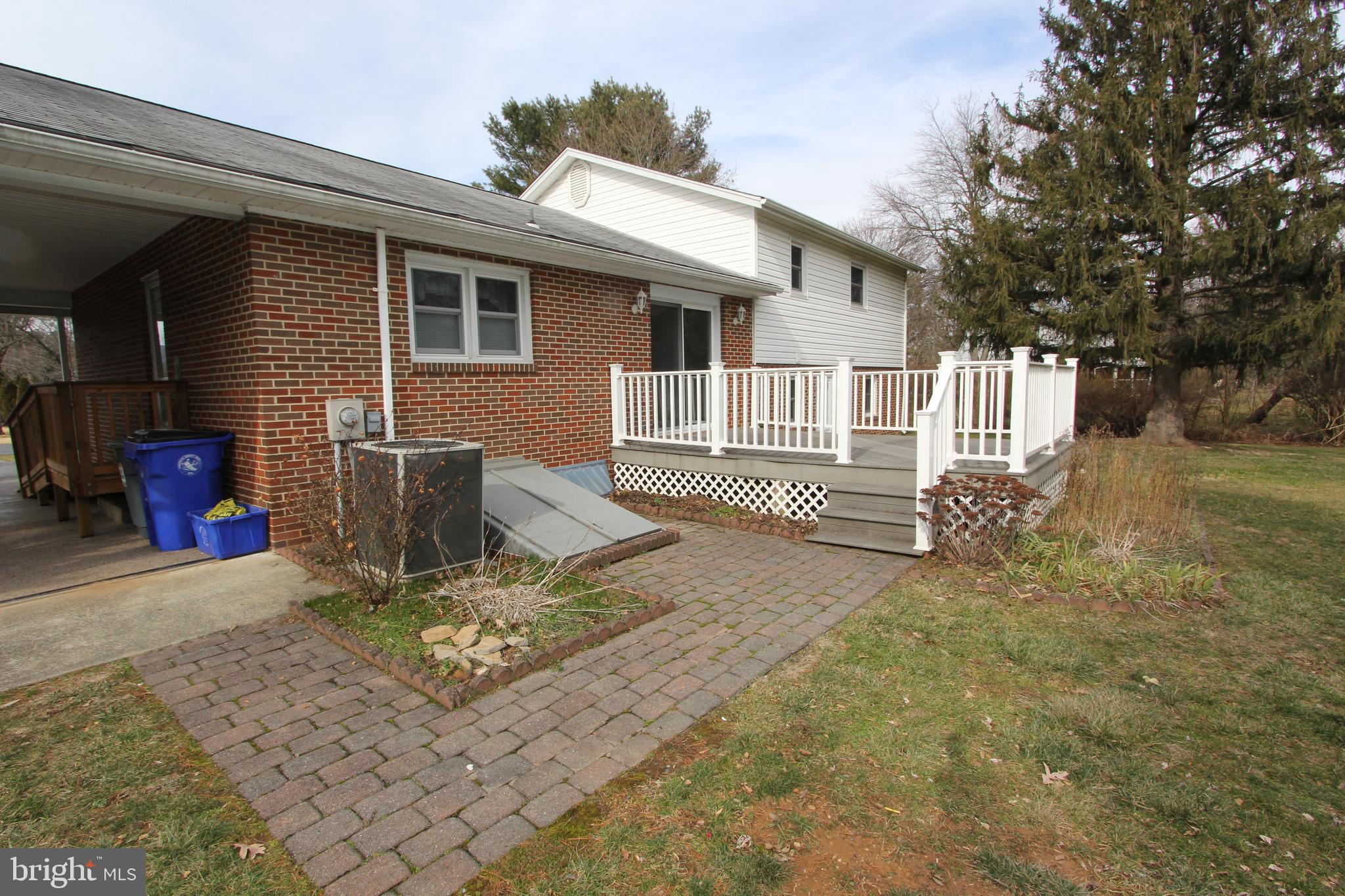 8001 Clearfield Road Frederick, MD 21702 - Photo 48 of 55 Rear patio with view towards the deck
