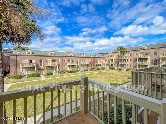 a view of a porch with a yard