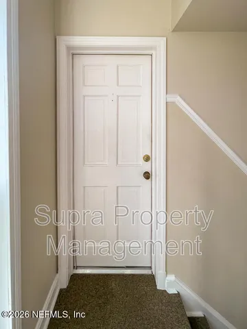 a kitchen with stainless steel appliances granite countertop a stove and a refrigerator