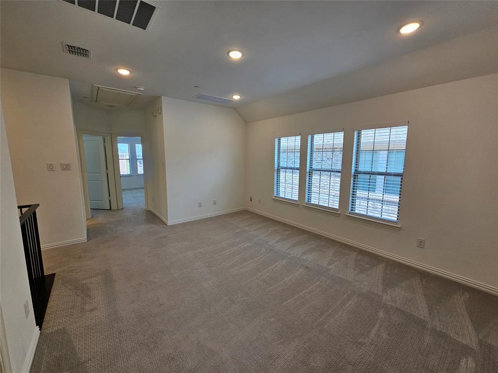 7280 Panicum Drive Frisco, TX 75033 - Photo 16 of 36 an empty room with windows