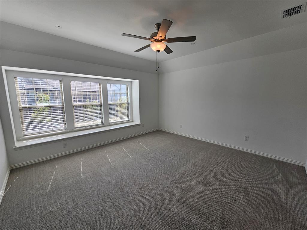 7280 Panicum Drive Frisco, TX 75033 - Photo 18 of 36 a view of an empty room with a window