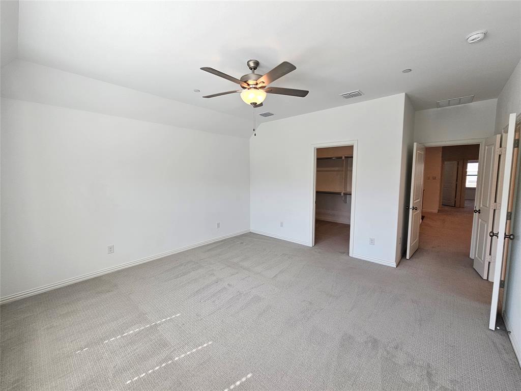 7280 Panicum Drive Frisco, TX 75033 - Photo 19 of 36 a view of a livingroom with a ceiling fan and window