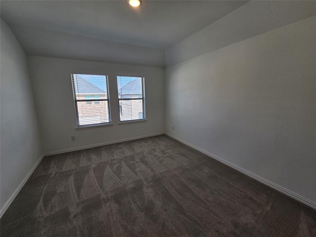 7280 Panicum Drive Frisco, TX 75033 - Photo 30 of 36 an empty room with a window