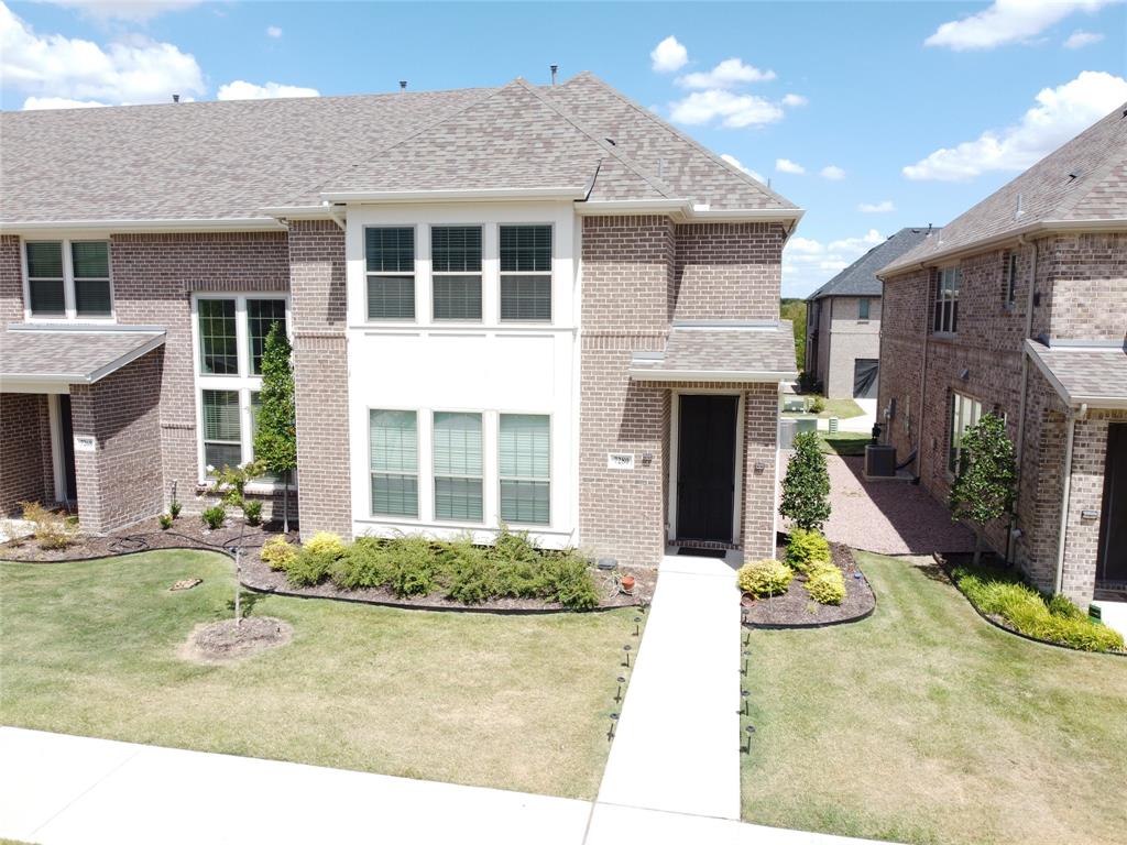 7280 Panicum Drive Frisco, TX 75033 - Photo 35 of 36 a front view of a house with a yard