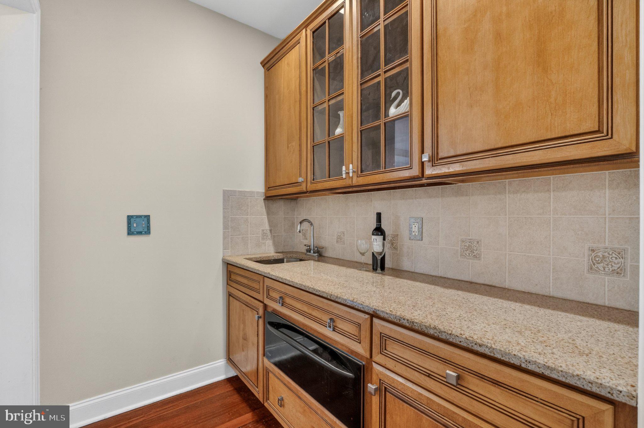 342 Ring Road Chadds Ford, PA 19317 - Photo 19 of 95 Elegant kitchen with rich wood tones.