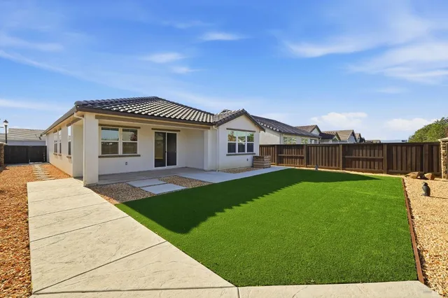 a bathroom with a shower and a mirror