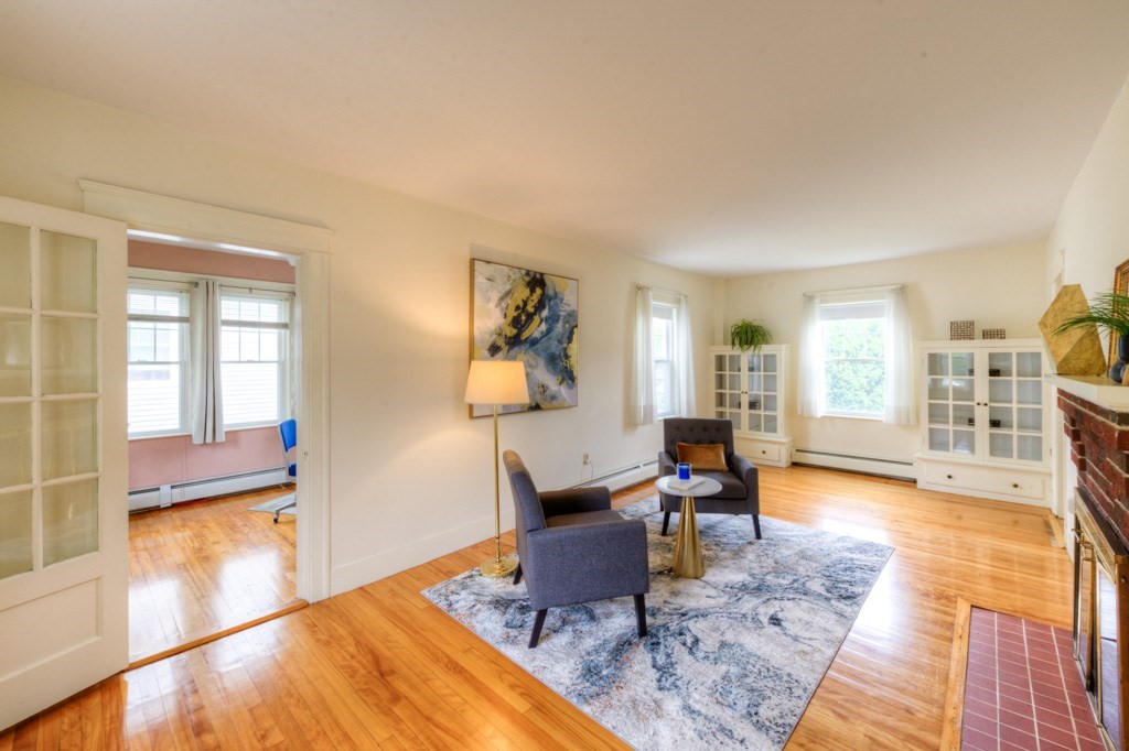 5 Bellingham Road Worcester, MA 01606 - Photo 3 of 30 a living room with furniture and a wooden floor