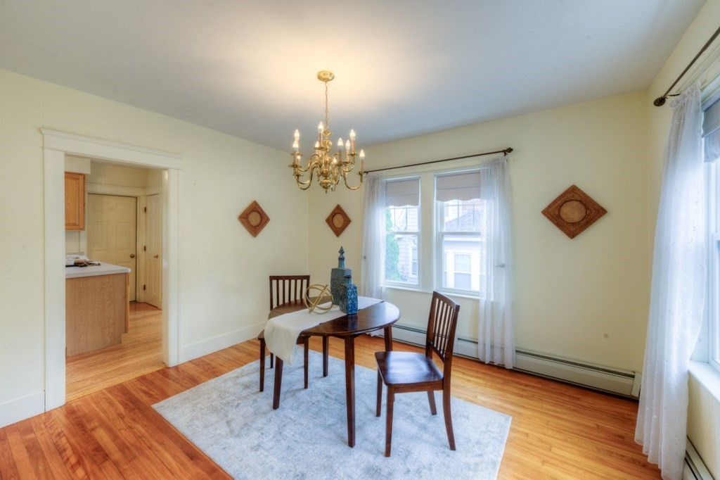 5 Bellingham Road Worcester, MA 01606 - Photo 7 of 30 a view of a dining room with furniture and wooden floor