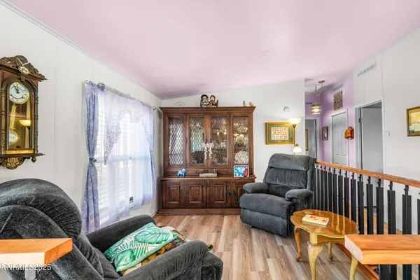 a bedroom with a bed and dresser