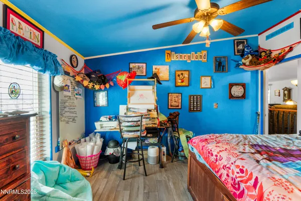 a bedroom with a bed and furniture