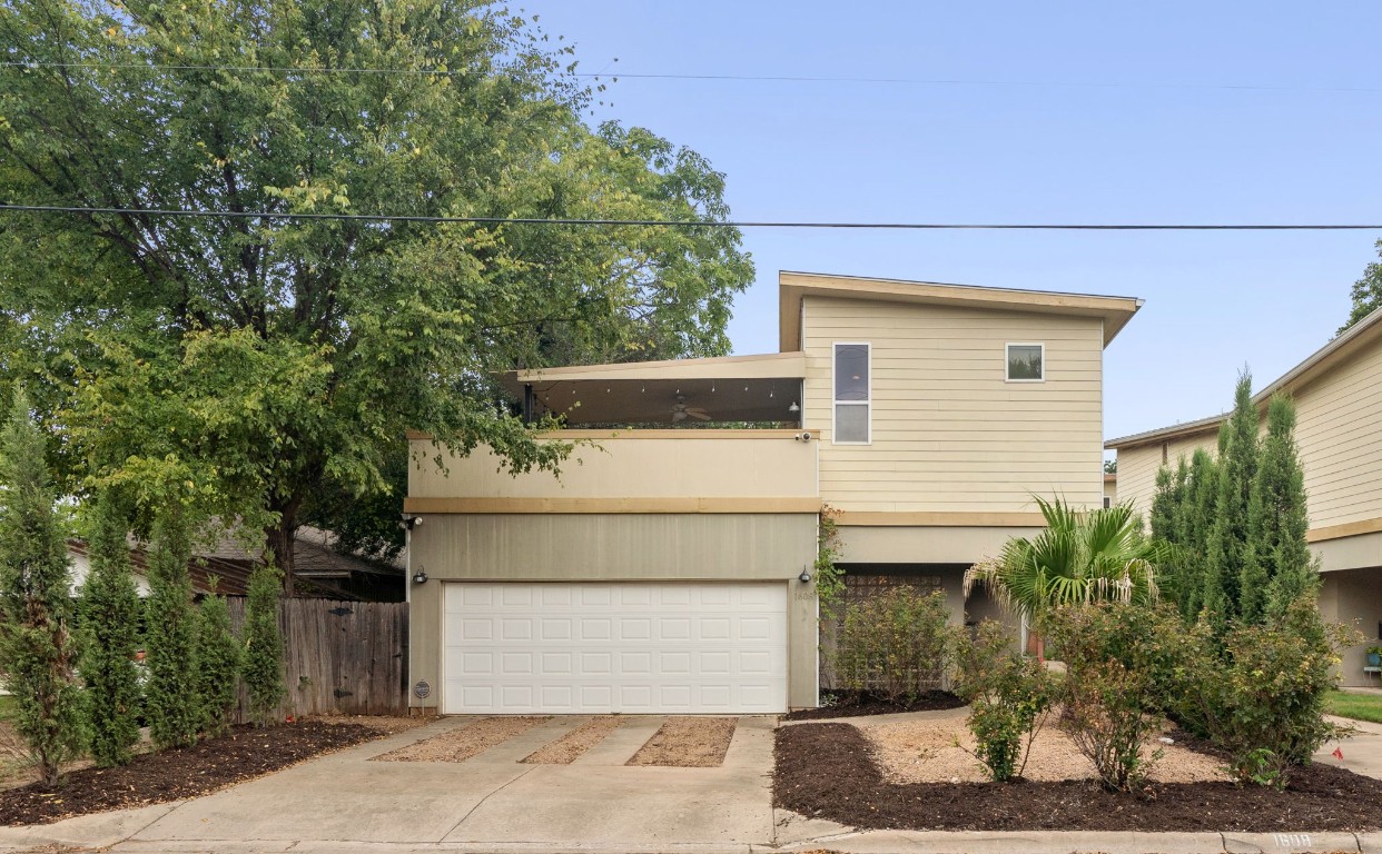 1608 Haskell Street, Unit A Austin, TX 78702 - Photo 1 of 1 a white house with tree in front of it