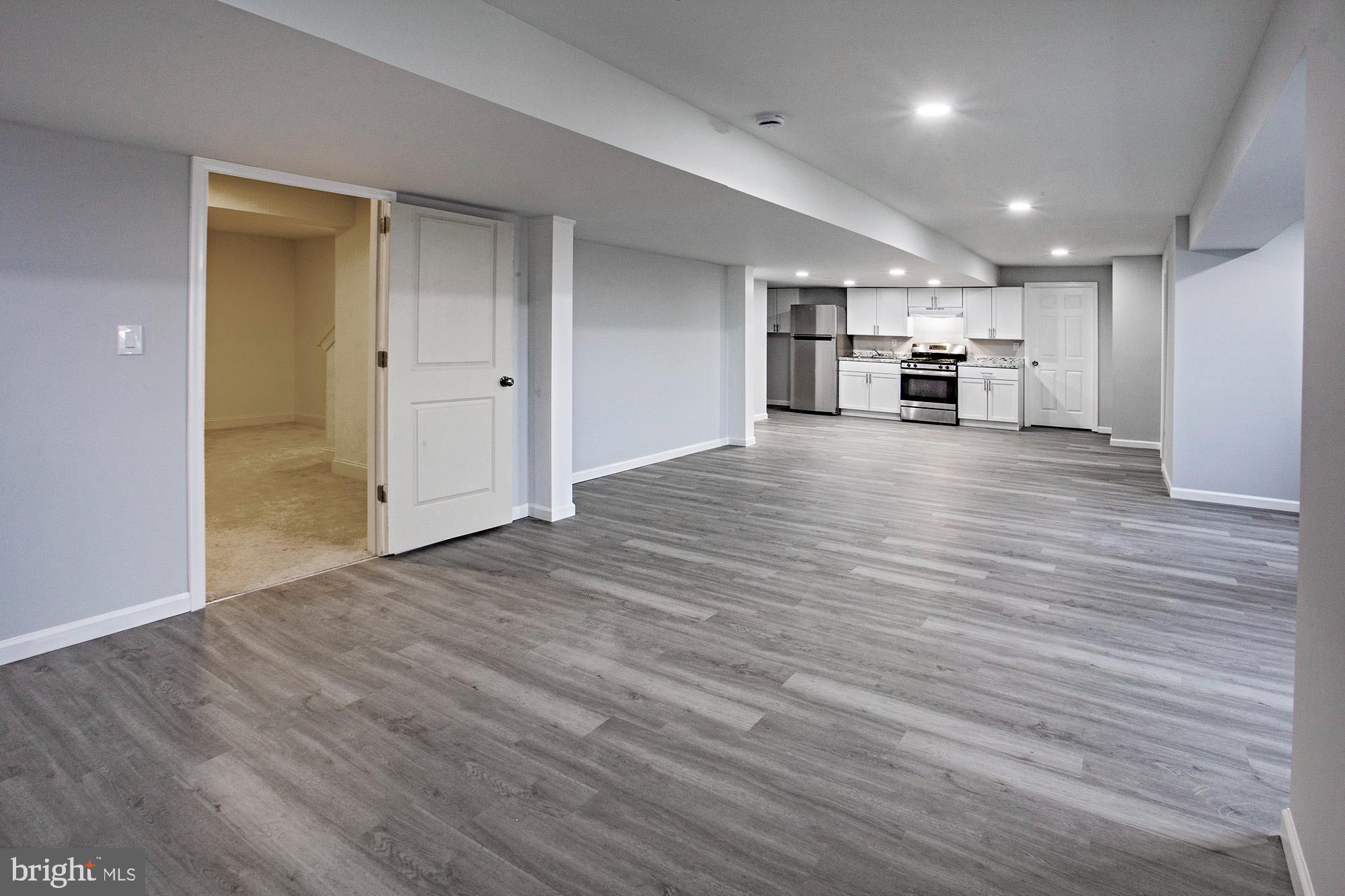 653 Gordon House Way Middletown, DE 19709 - Photo 1 of 7 a view of kitchen and wooden floor