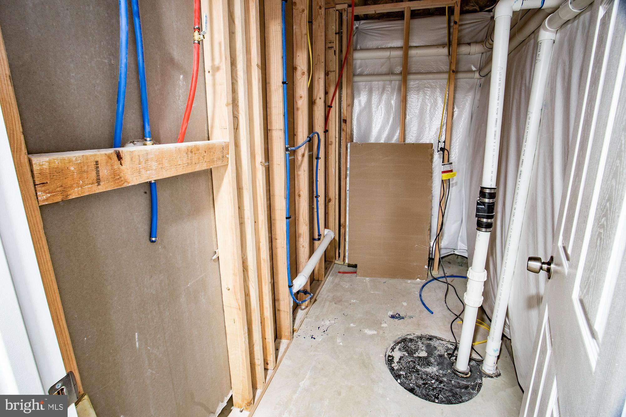 653 Gordon House Way Middletown, DE 19709 - Photo 6 of 7 a view of a bathroom with a tub and shower