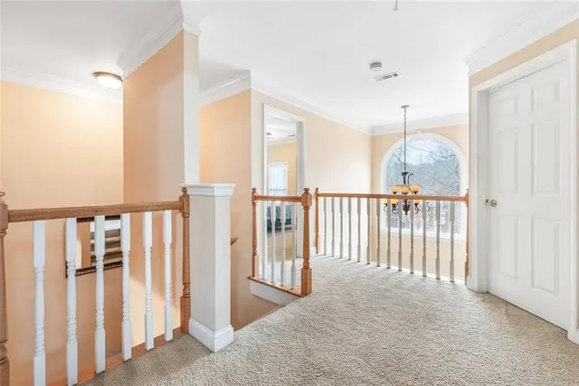 a view of a porch with wooden floor