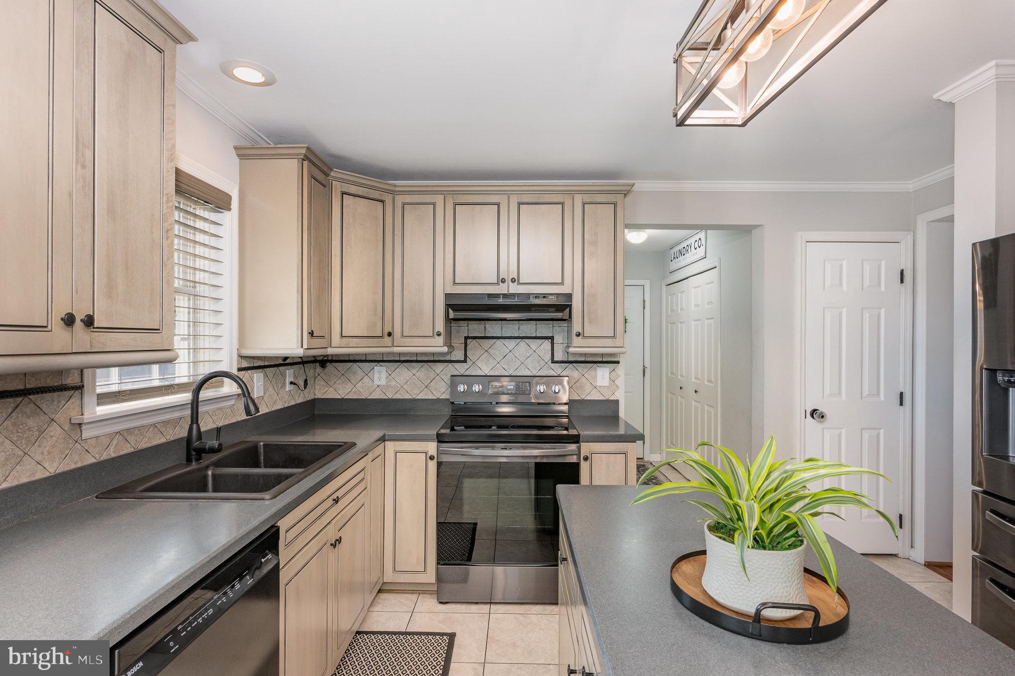 1301 Hopewell Road Port Deposit, MD 21904 - Photo 20 of 47 Kitchen with Kraftmaid Pewter Glazed cabinetry.