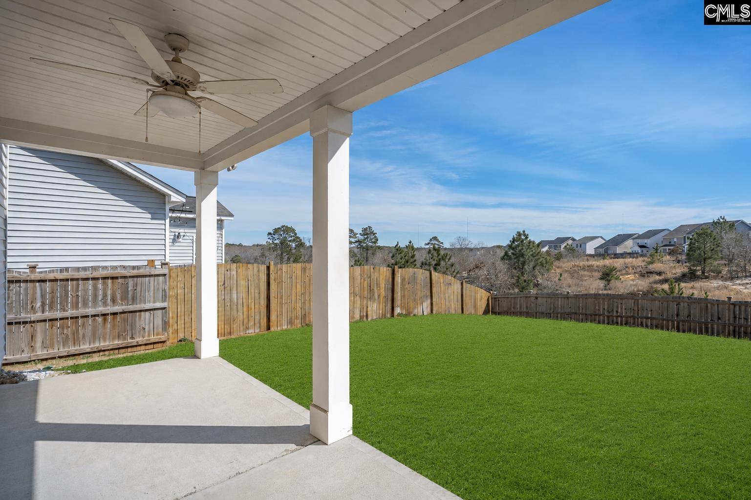 748 North Pinewalk Way Elgin, SC 29045 - Photo 17 of 25 a view of a backyard with a garden