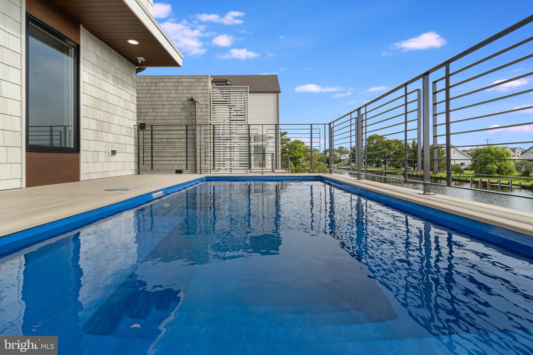 316 York Road Bethany Beach, DE 19930 - Photo 101 of 104 a view of swimming pool with outdoor seating