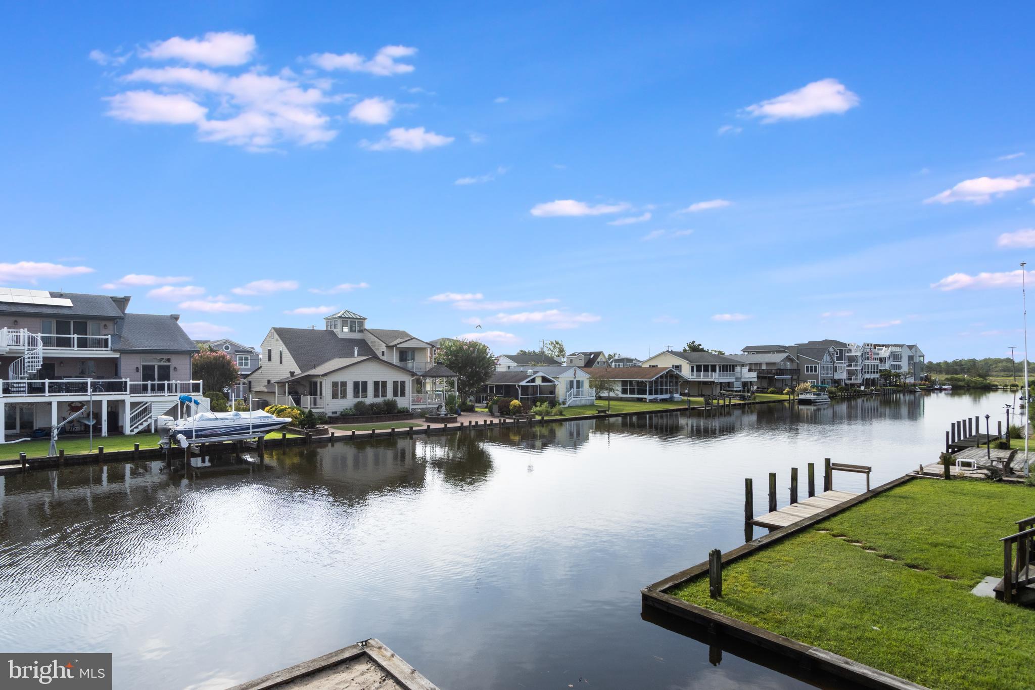 316 York Road Bethany Beach, DE 19930 - Photo 103 of 104 a view of a lake with houses in the back