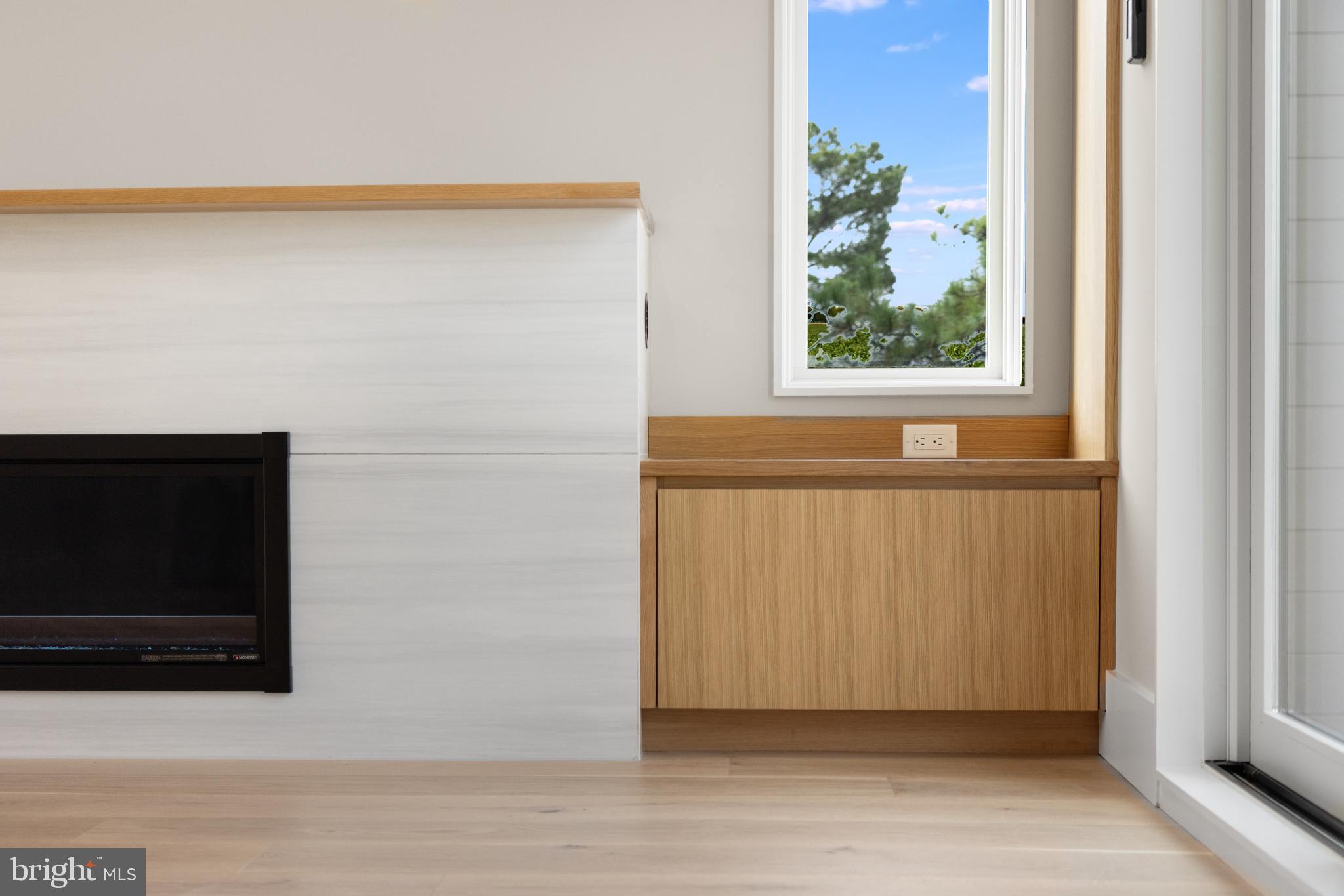316 York Road Bethany Beach, DE 19930 - Photo 20 of 104 a view of an empty room with wooden floor and a window