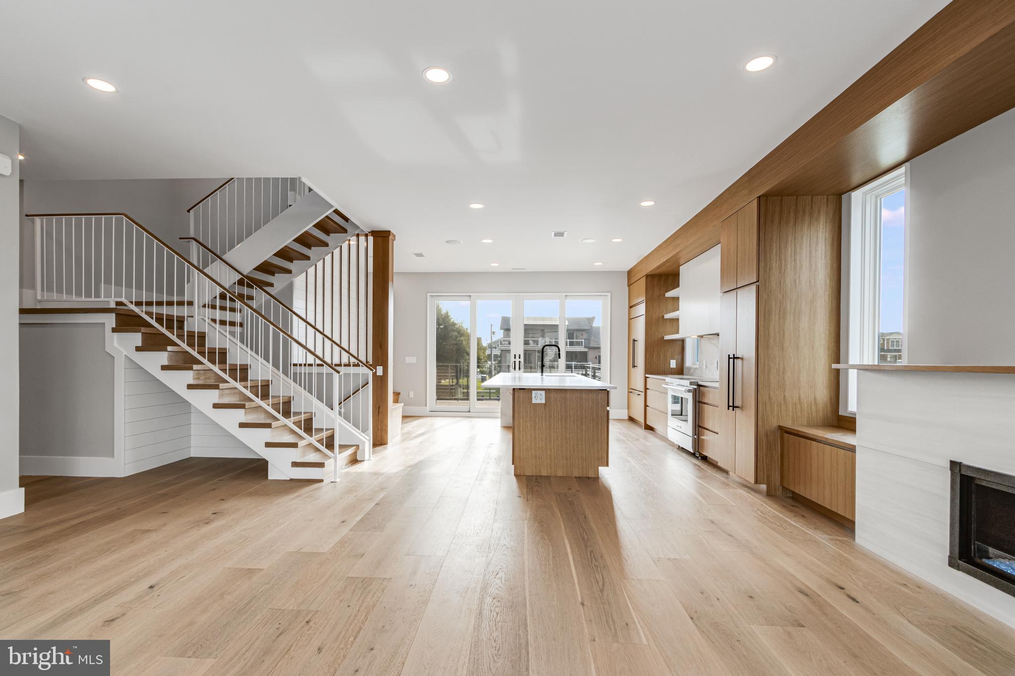 316 York Road Bethany Beach, DE 19930 - Photo 22 of 104 a view of a kitchen with furniture and wooden floor
