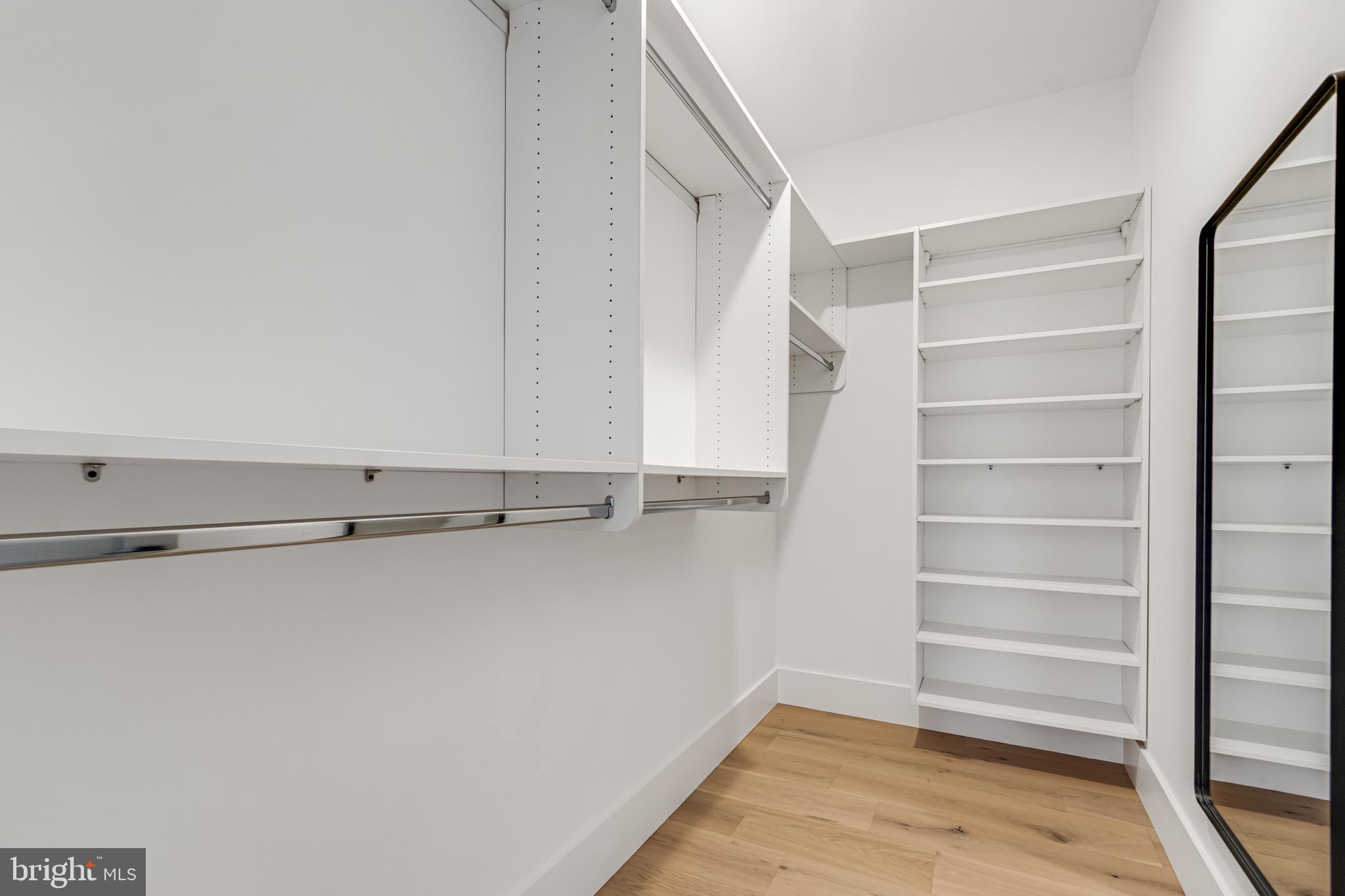 316 York Road Bethany Beach, DE 19930 - Photo 25 of 104 a view of walk in closet with empty racks