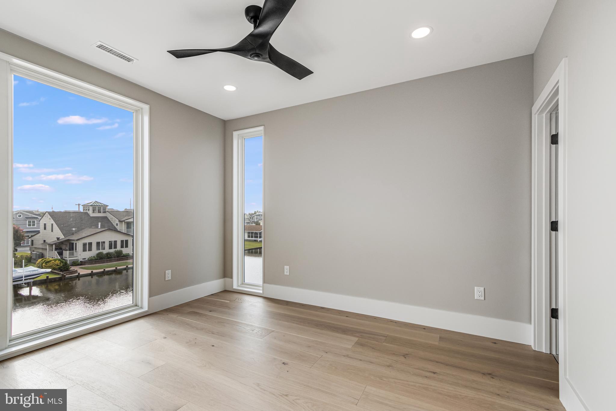 316 York Road Bethany Beach, DE 19930 - Photo 40 of 104 a view of a livingroom with a ceiling fan and window