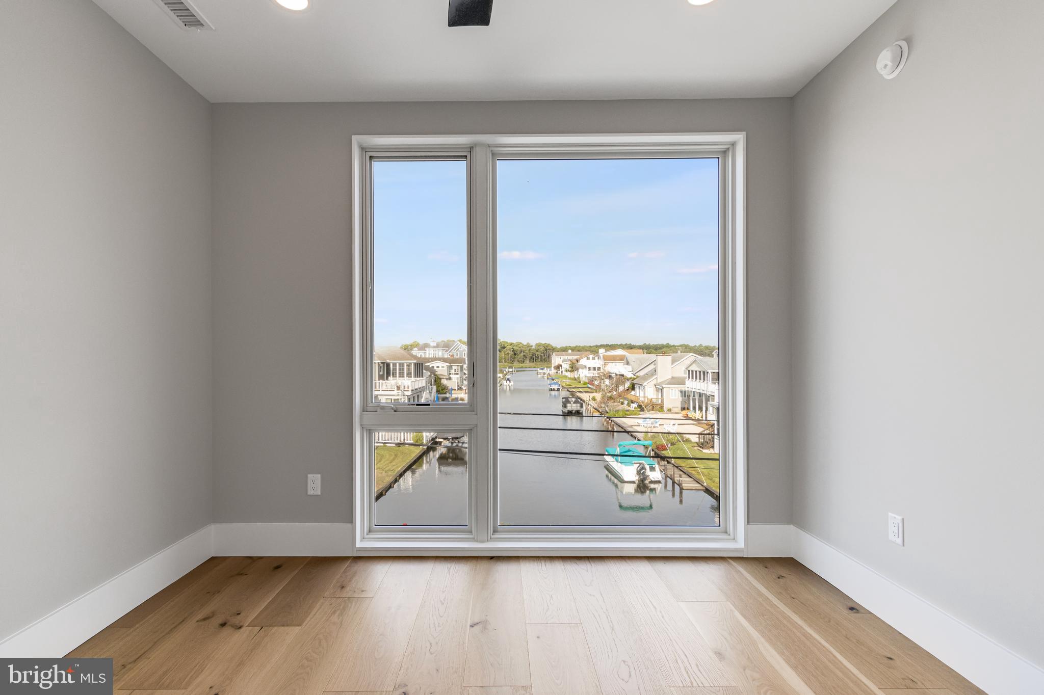 316 York Road Bethany Beach, DE 19930 - Photo 51 of 104 a view of an entryway with wooden floor