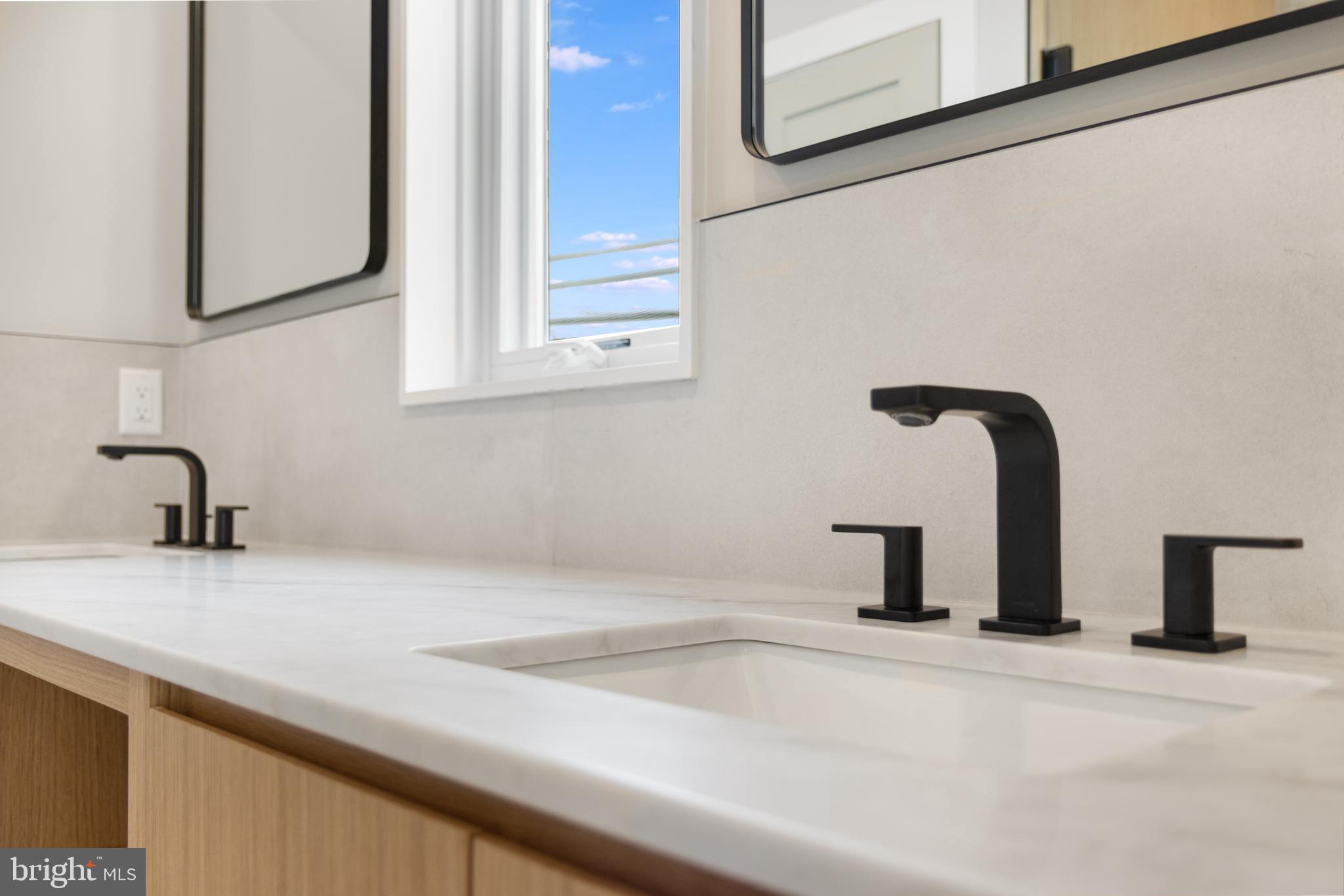 316 York Road Bethany Beach, DE 19930 - Photo 64 of 104 a bathroom with a sink and mirror