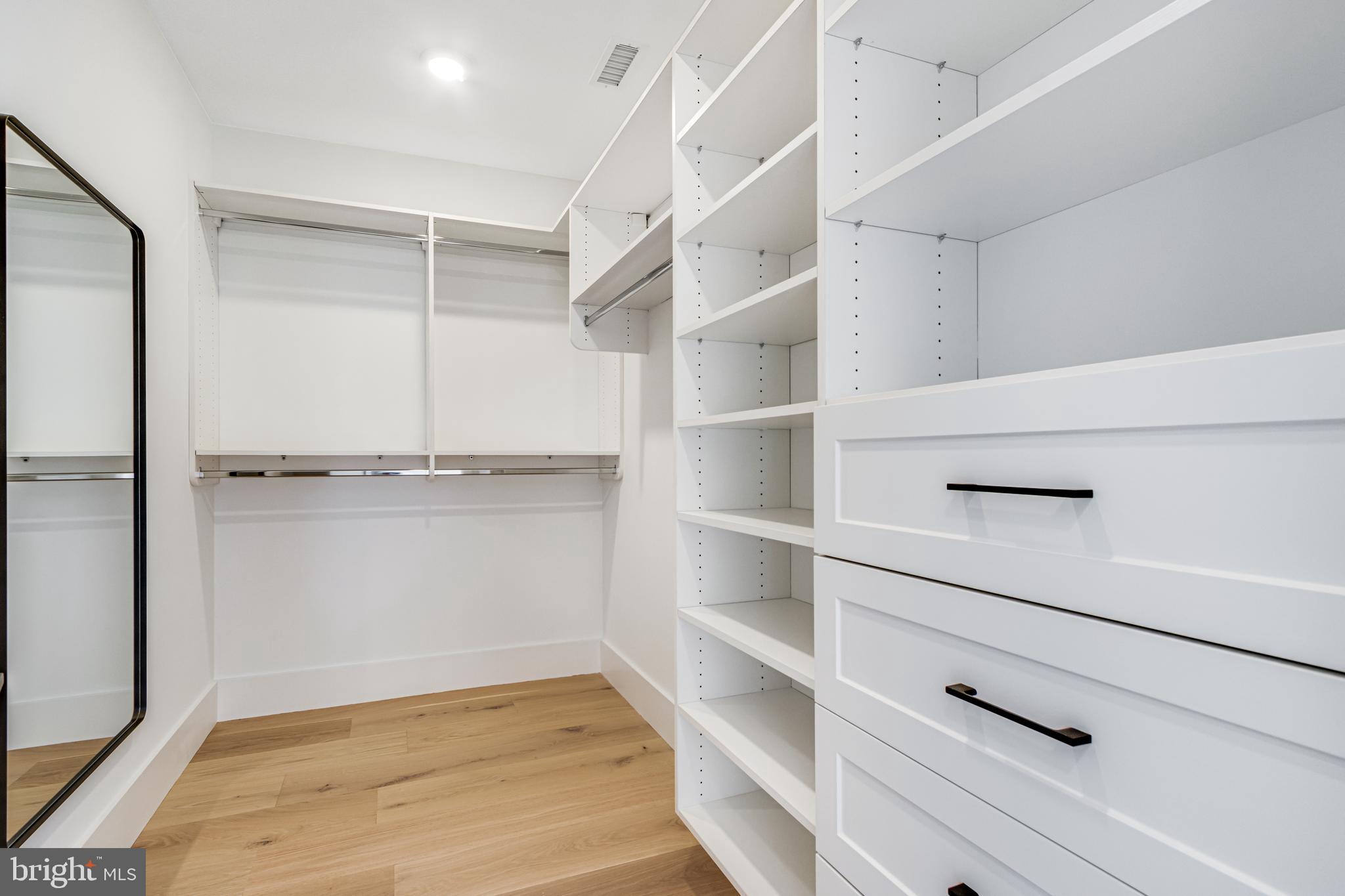 316 York Road Bethany Beach, DE 19930 - Photo 70 of 104 a view of walk in closet with empty racks