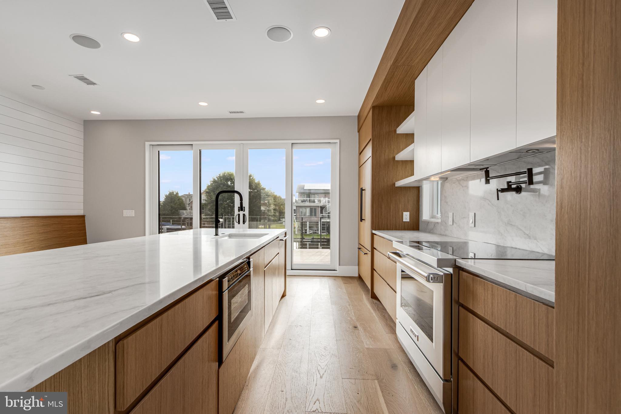 316 York Road Bethany Beach, DE 19930 - Photo 7 of 104 a large kitchen with stainless steel appliances lots of counter top space