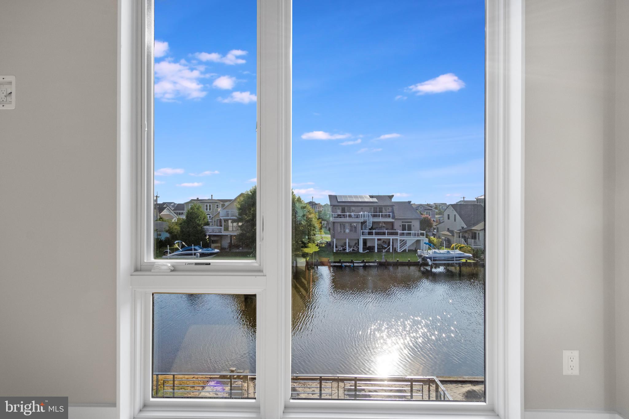 316 York Road Bethany Beach, DE 19930 - Photo 74 of 104 a view of a lake from a balcony