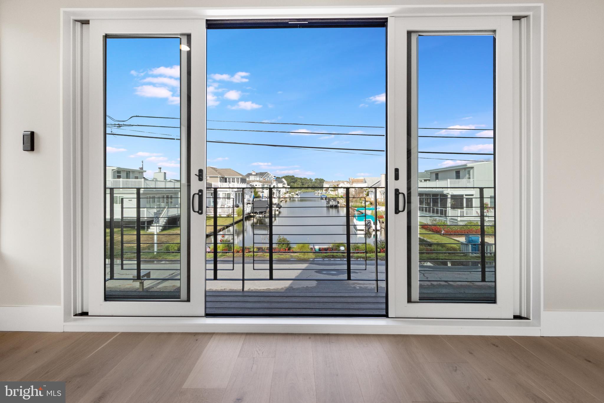 316 York Road Bethany Beach, DE 19930 - Photo 90 of 104 a view of a glass door with a door and a balcony