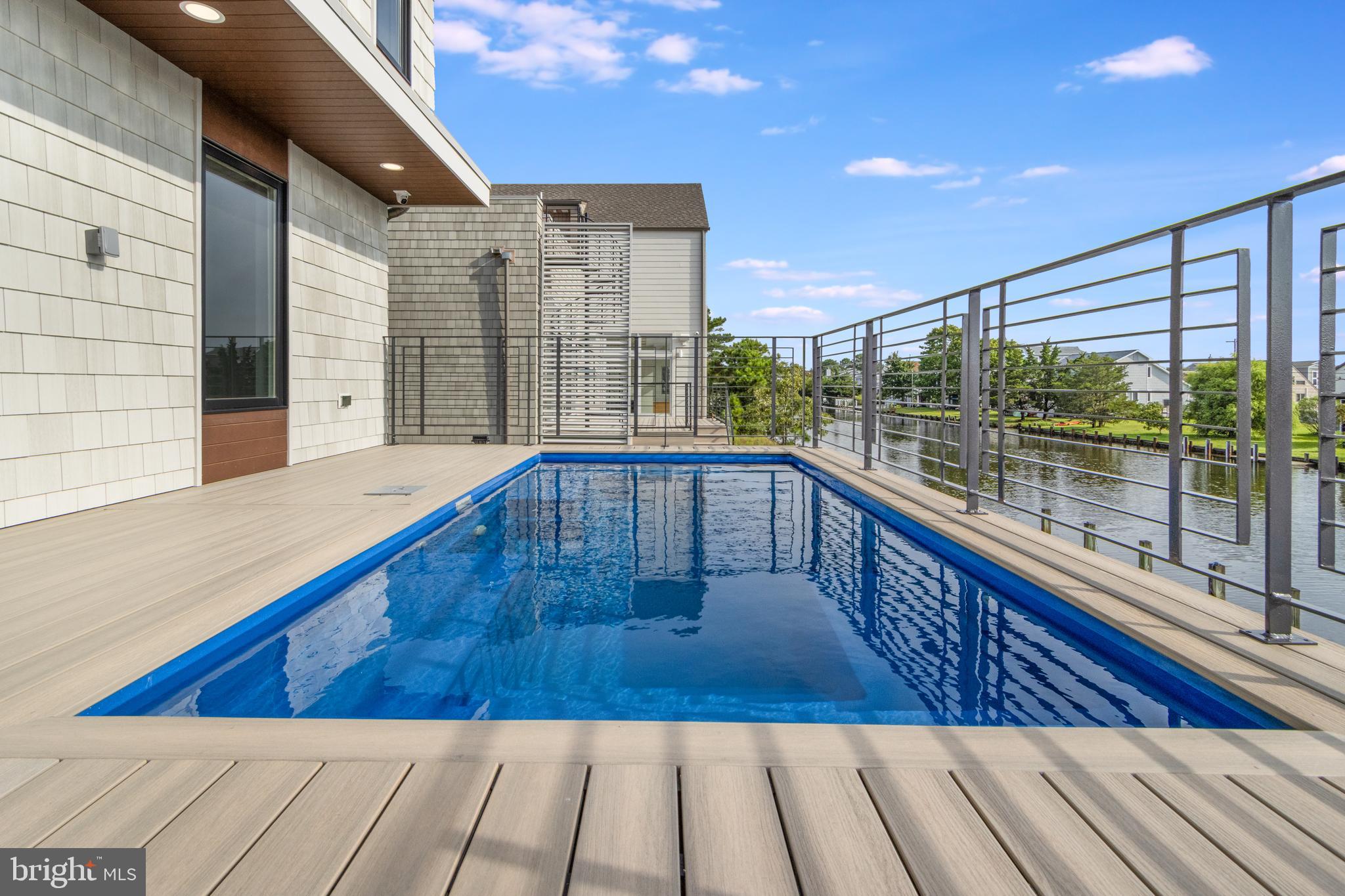 316 York Road Bethany Beach, DE 19930 - Photo 97 of 104 a view of swimming pool with outdoor seating