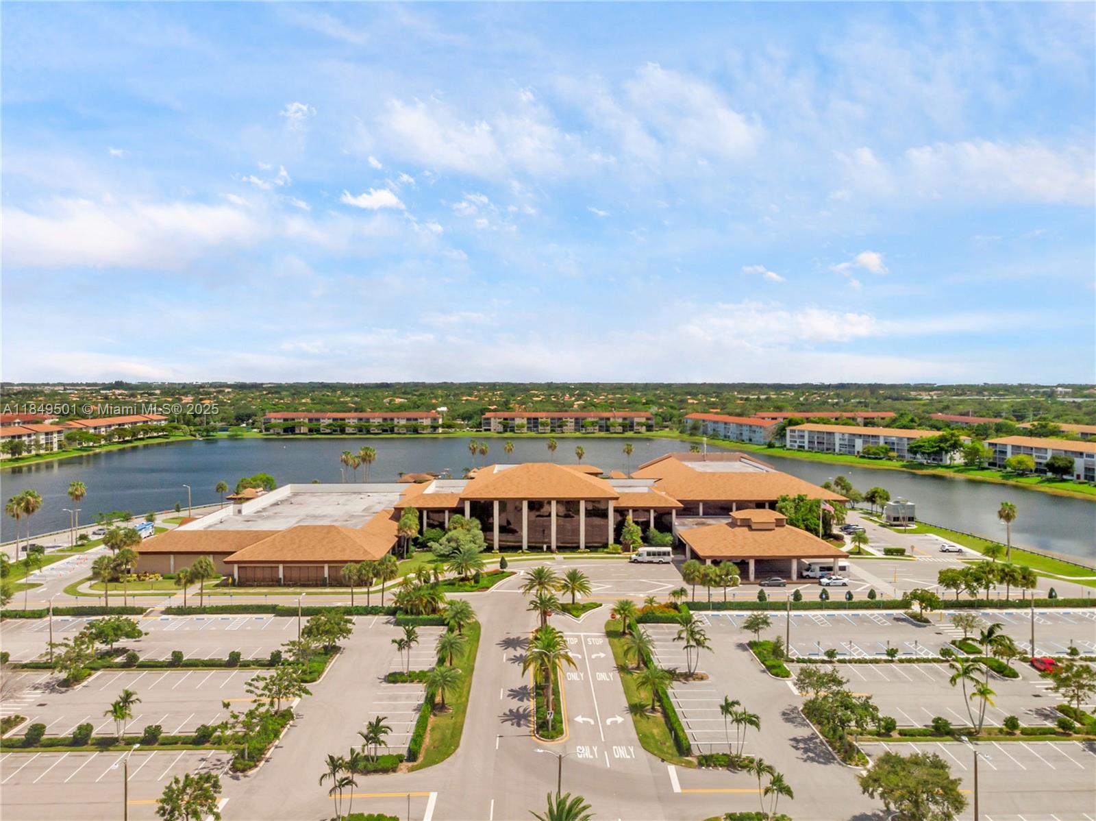13455 Southwest 16th Court, Unit 104F Pembroke Pines, FL 33027 - Photo 25 of 53 an aerial view of residential houses with outdoor space