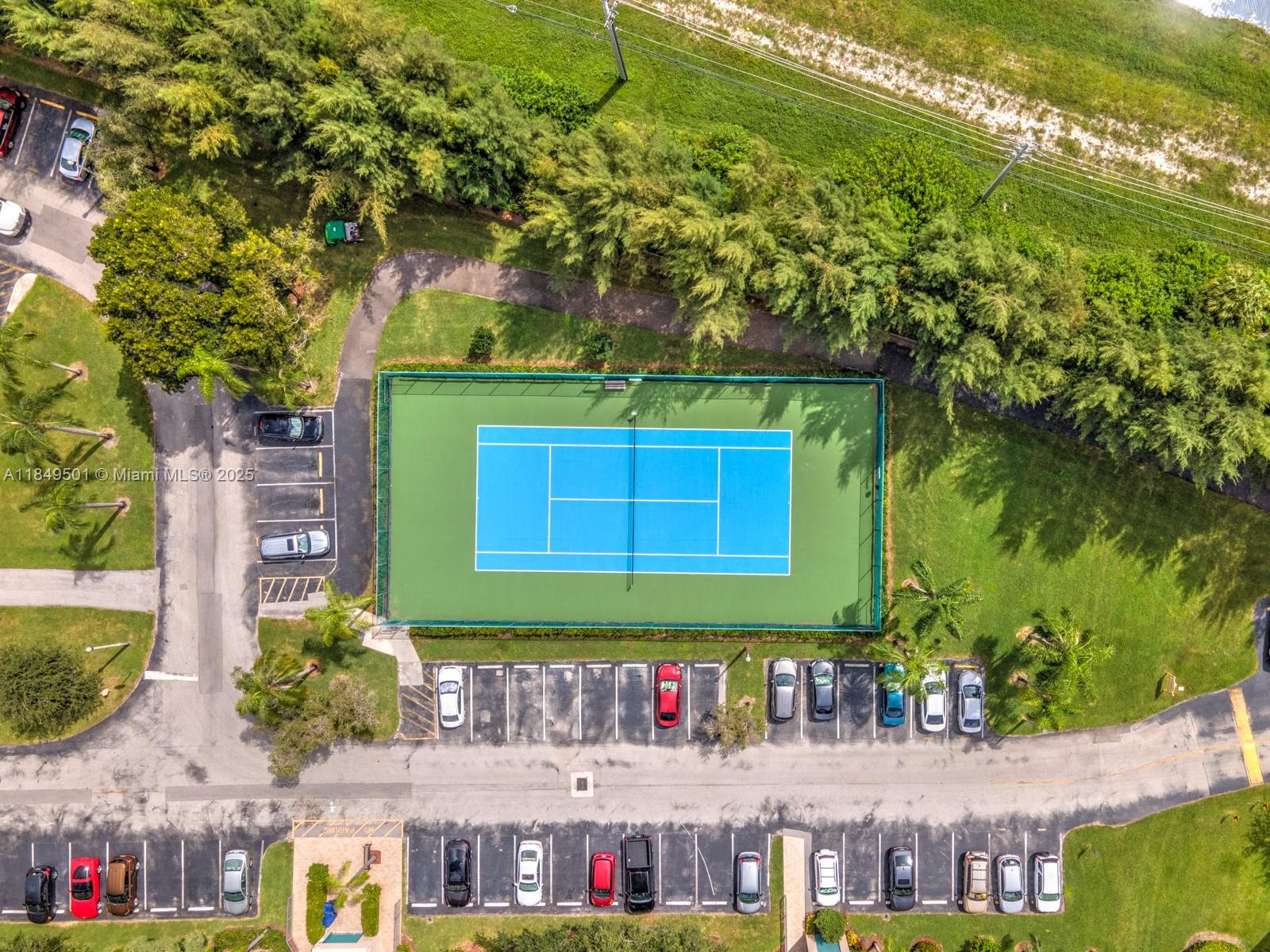 13455 Southwest 16th Court, Unit 104F Pembroke Pines, FL 33027 - Photo 36 of 53 a view of a chairs and table in a patio