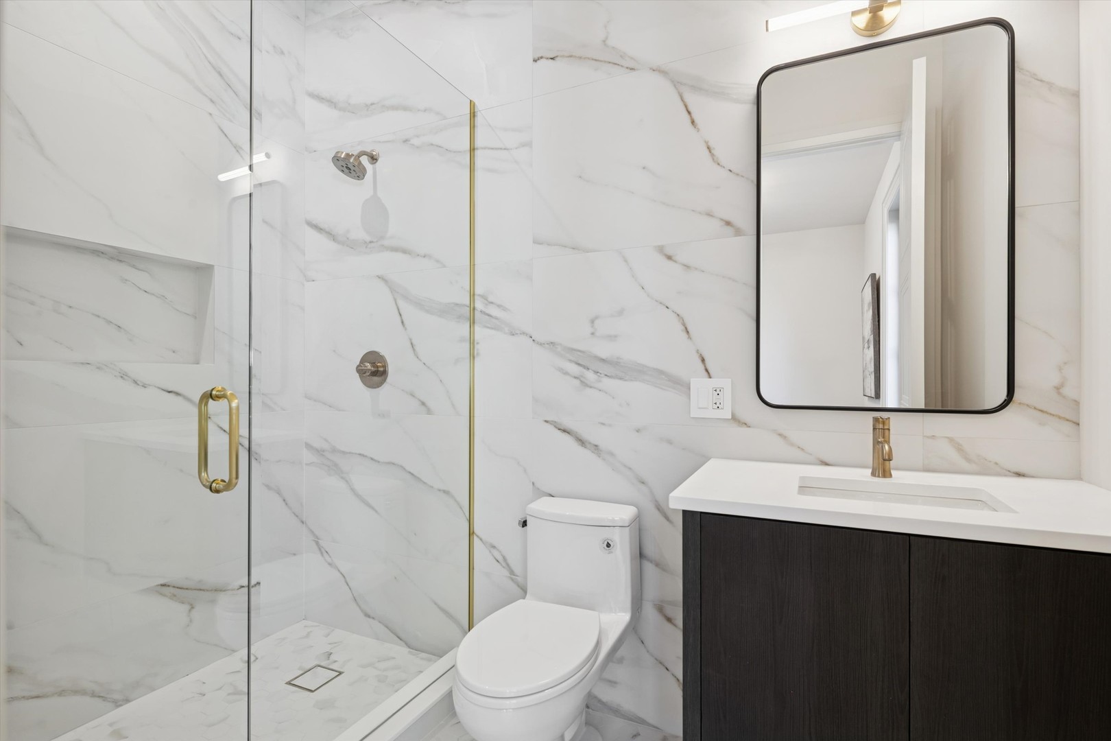 377 Prairie Avenue Elmhurst, IL 60126 - Photo 35 of 64 a bathroom with a sink a toilet and shower