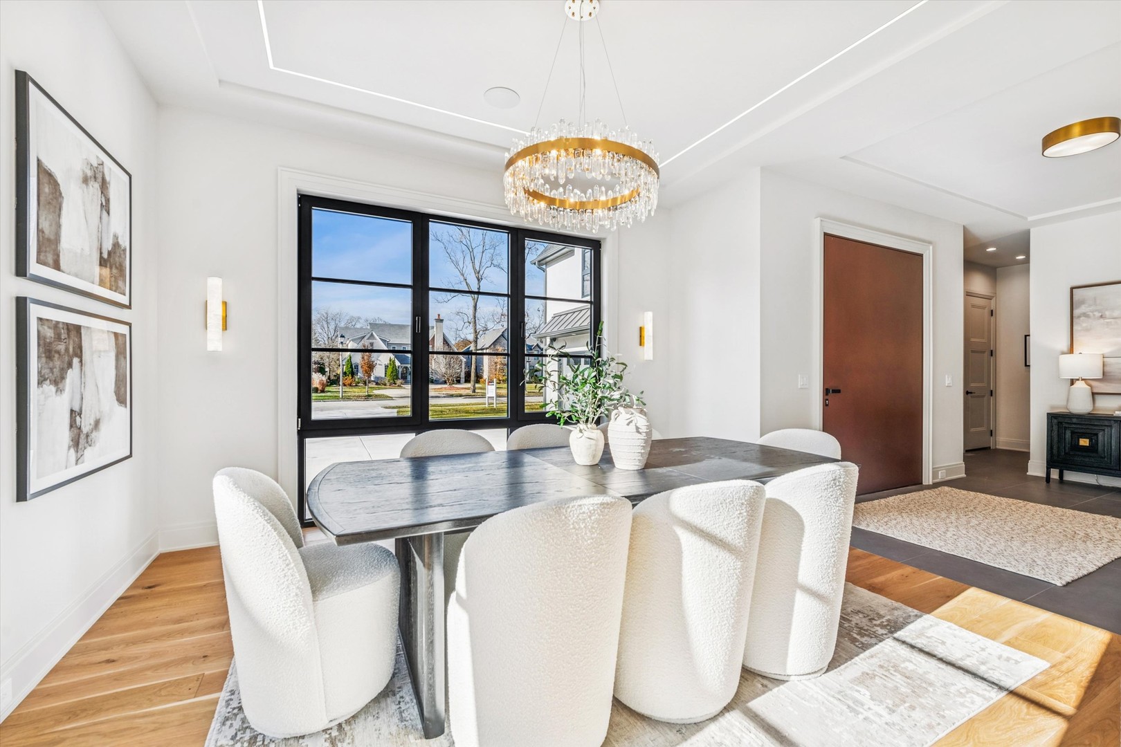 377 Prairie Avenue Elmhurst, IL 60126 - Photo 4 of 64 a dining room with furniture a floor to ceiling window and wooden floor