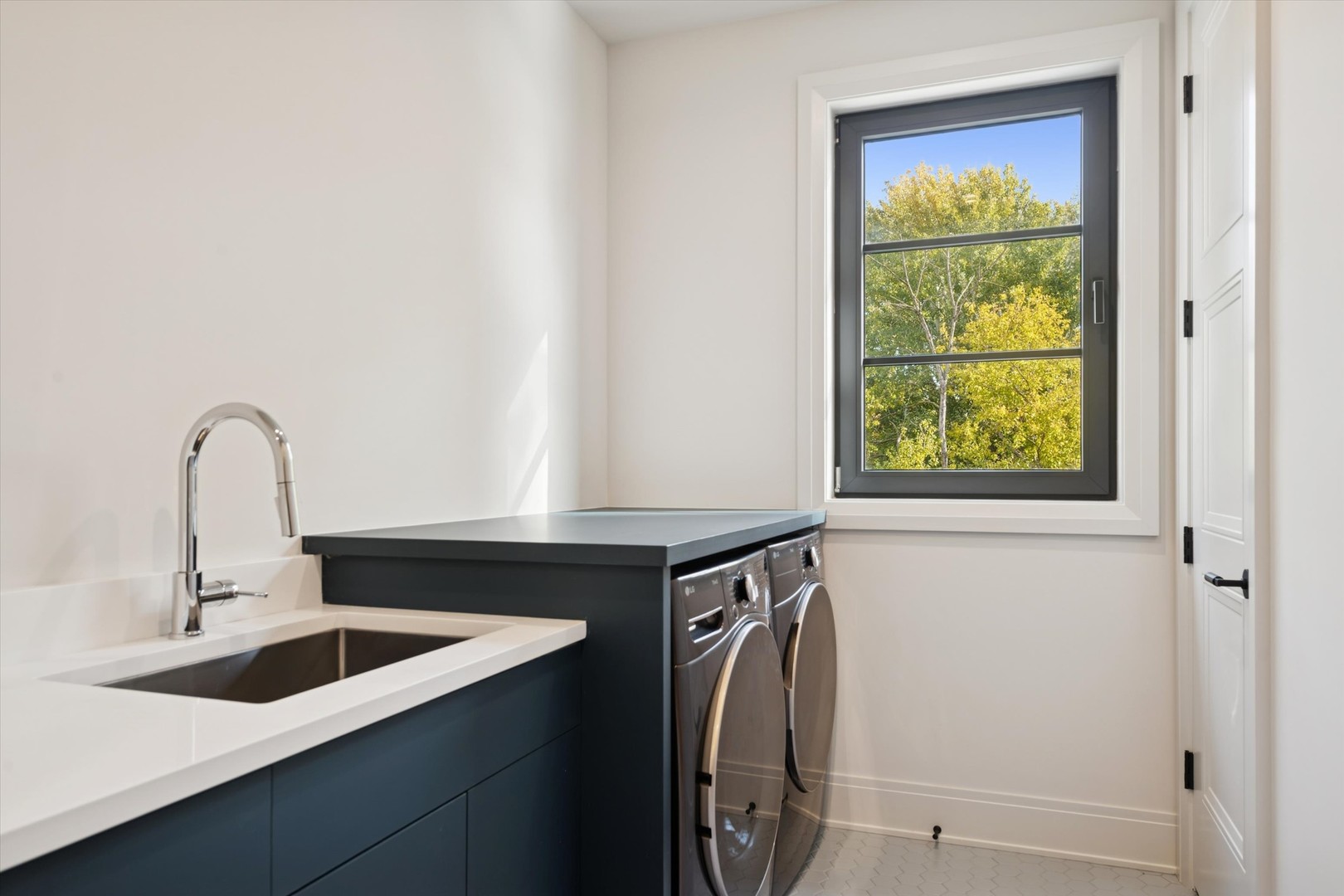 377 Prairie Avenue Elmhurst, IL 60126 - Photo 42 of 64 a close up of a sink and a window