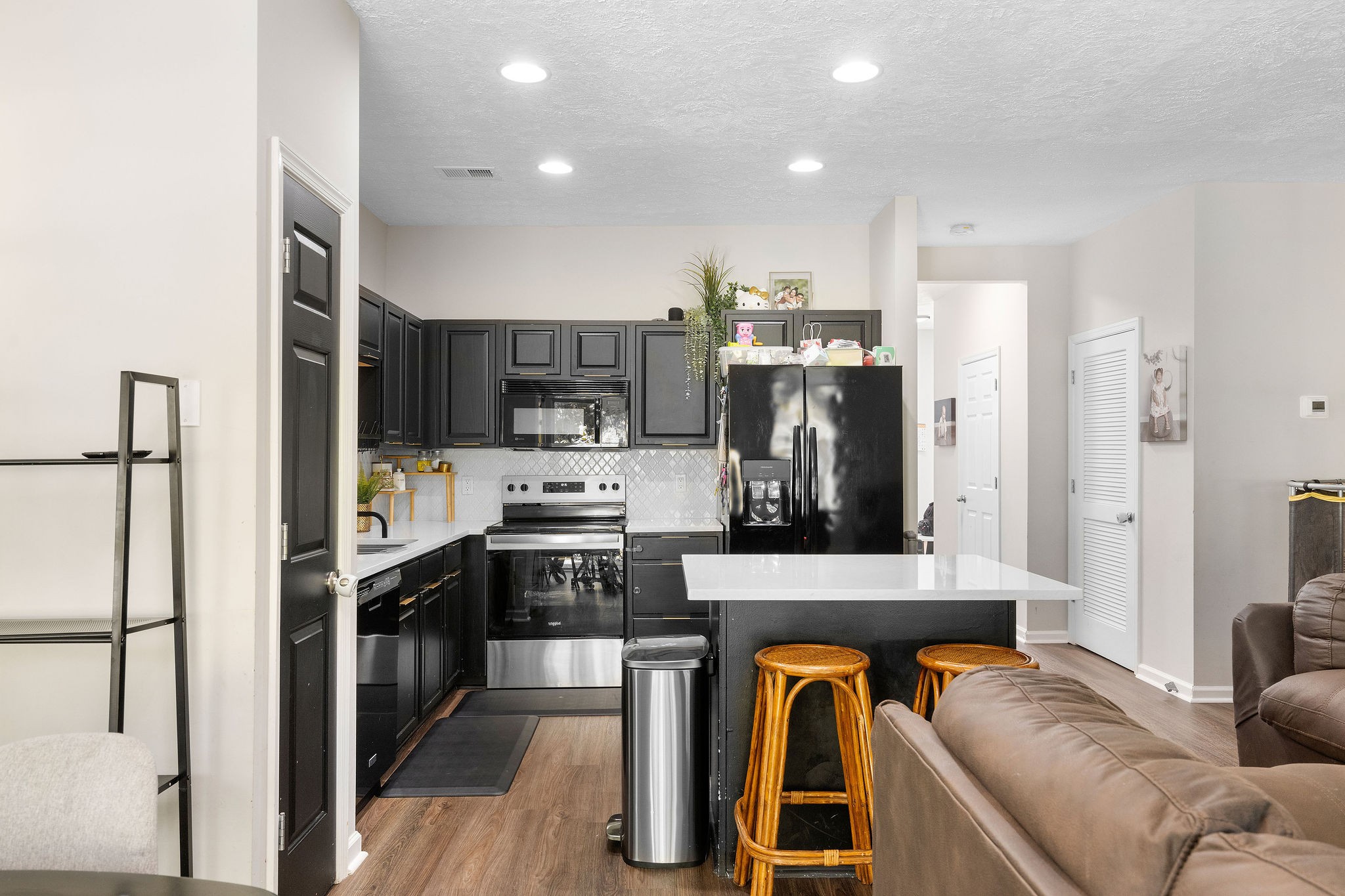 1345 Bell Road, Unit 405 Antioch, TN 37013 - Photo 4 of 14 a kitchen with stainless steel appliances granite countertop a refrigerator a stove and a sink