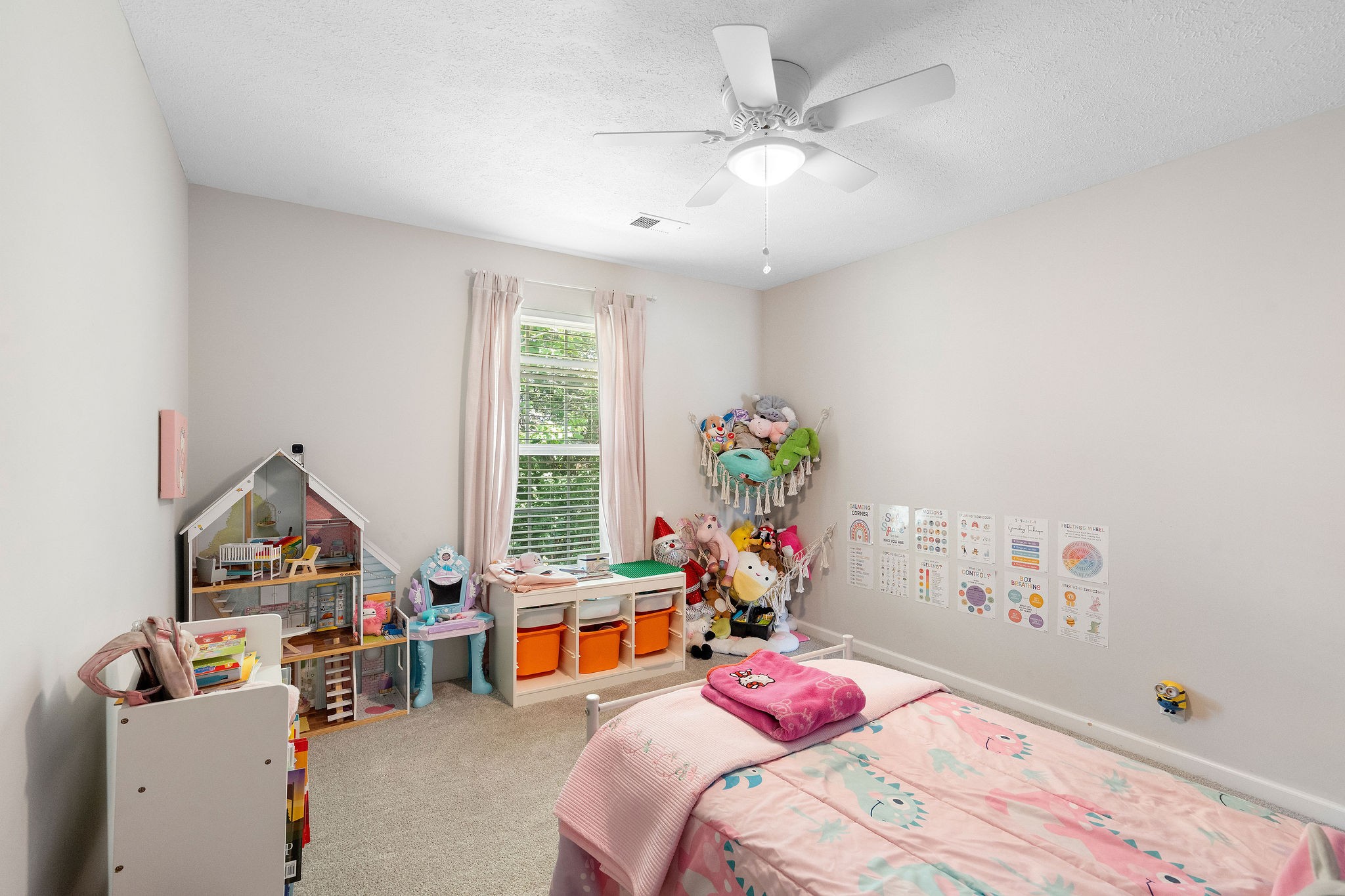 1345 Bell Road, Unit 405 Antioch, TN 37013 - Photo 9 of 14 a bedroom with furniture a bed and a chandelier