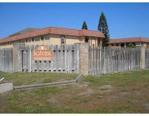 a sign on the side of a building