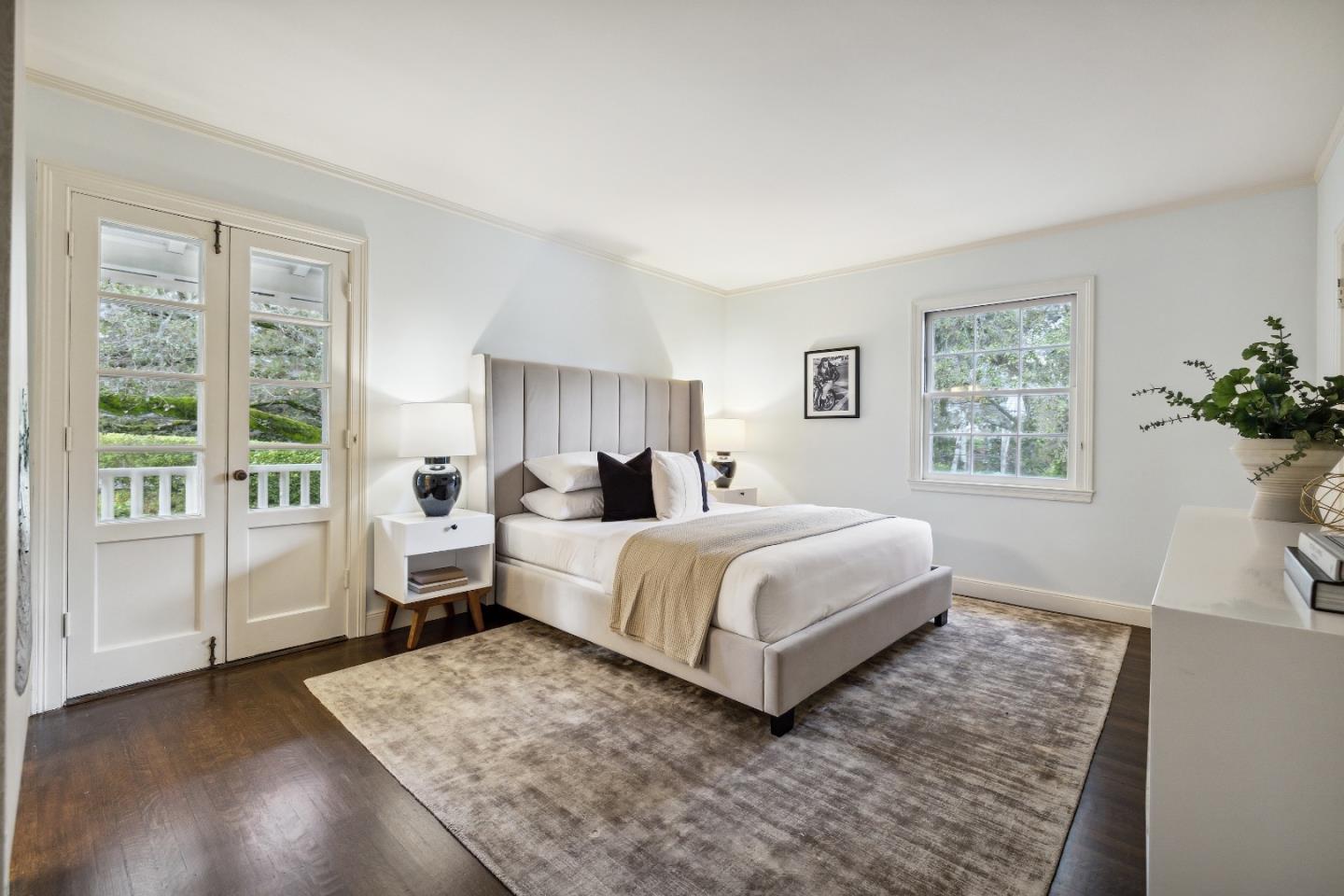 865 Culebra Road Hillsborough, CA 94010 - Photo 15 of 32 a bedroom with a large bed and a window