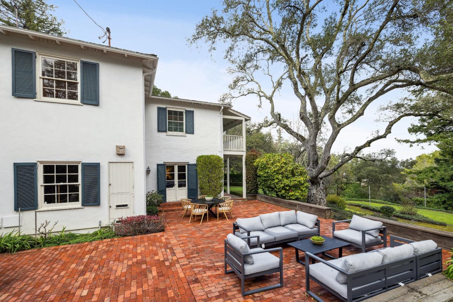 865 Culebra Road Hillsborough, CA 94010 - Photo 27 of 32 a view of a patio with couches and a fire pit