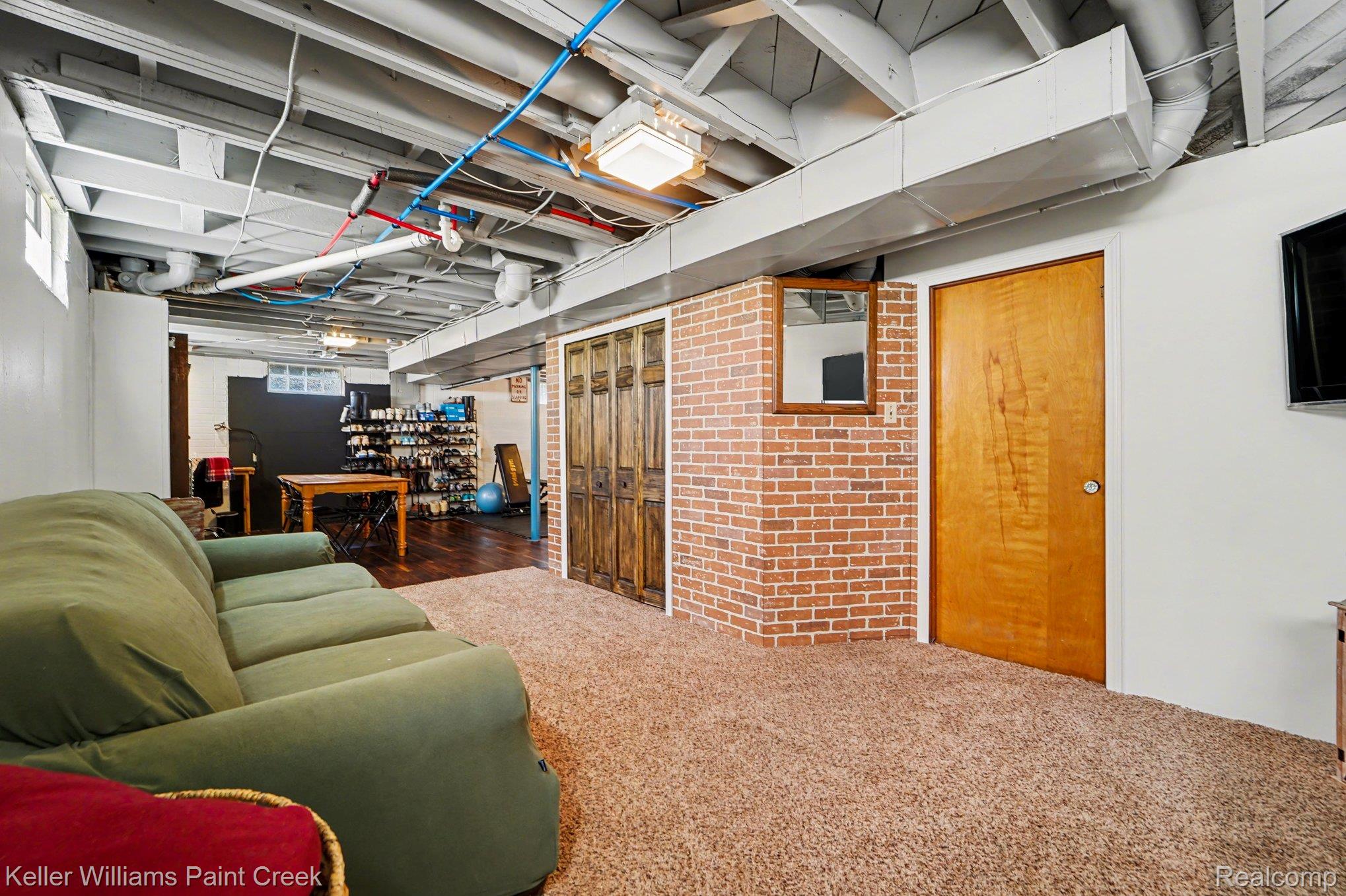 1404 West Eleven Mile Road Berkley, MI 48072 - Photo 14 of 20 The industrial basement adds more living space!