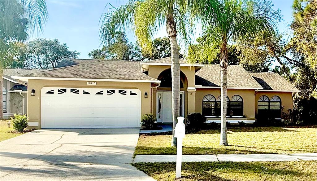 front view of house with a yard