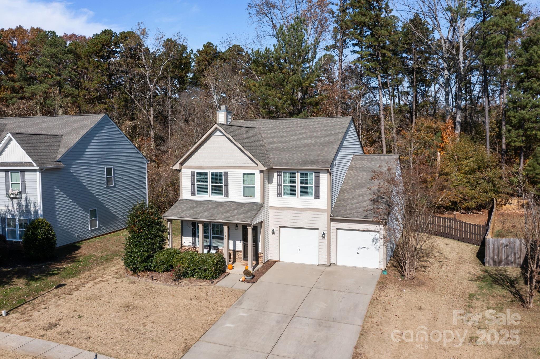 125 Devynn Ridge Court Mount Holly, NC 28120 - Photo 12 of 47 a view of house with outdoor space