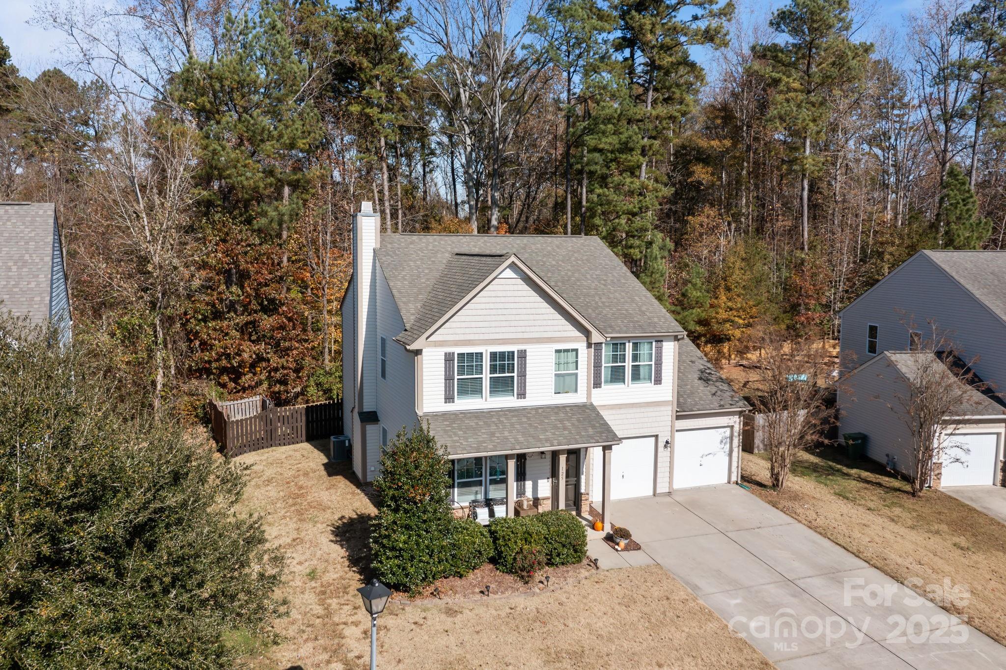 125 Devynn Ridge Court Mount Holly, NC 28120 - Photo 14 of 47 front view of a house with a yard